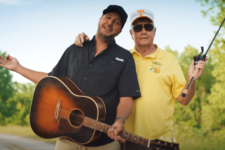 Bill Dance, Luke Bryan are posing for a picture