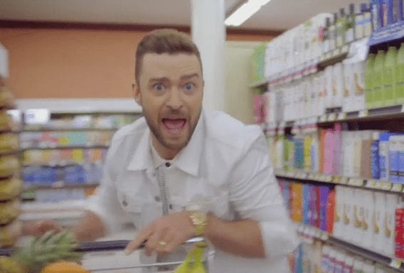 Justin Timberlake holding a tablet