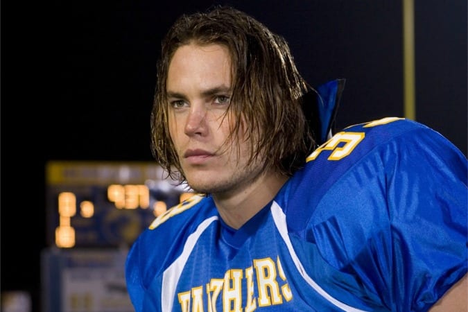 Taylor Kitsch wearing a jersey