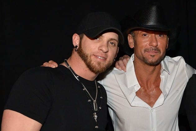 Brantley Gilbert, Tim McGraw posing for a picture