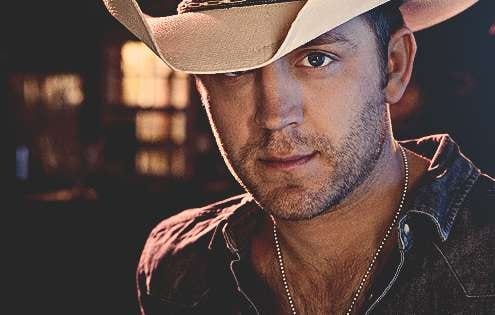 Justin Moore wearing a cowboy hat