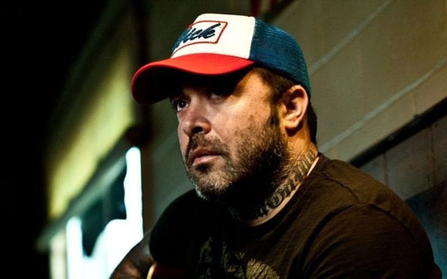 Aaron Lewis with a beard and a hat