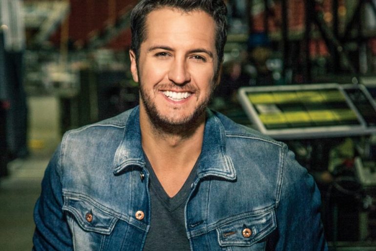 Luke Bryan smiling for the picture