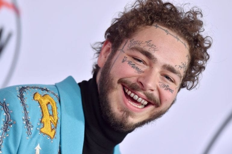 Post Malone smiling for the camera