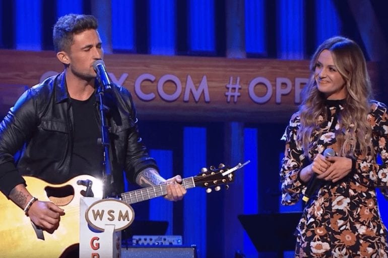 Michael Ray and woman playing guitar