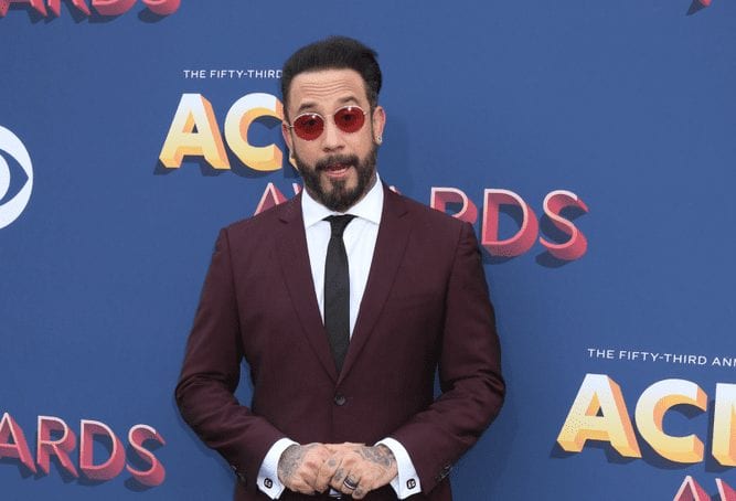 A.J. McLean wearing a suit and tie