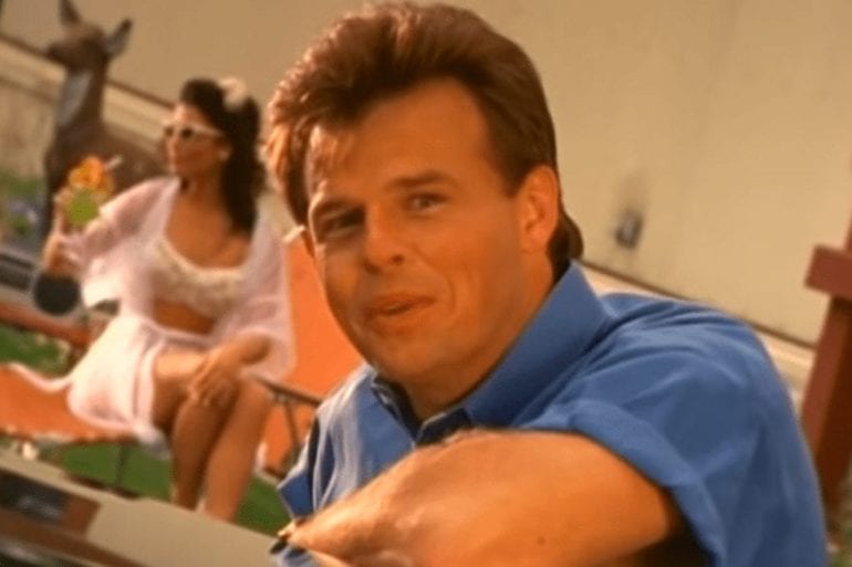 Sammy Kershaw sitting at a table