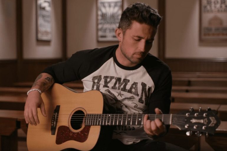 Michael Ray playing a guitar