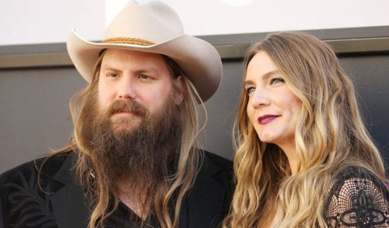 Chris Stapleton, Nicole Garcia are posing for a picture