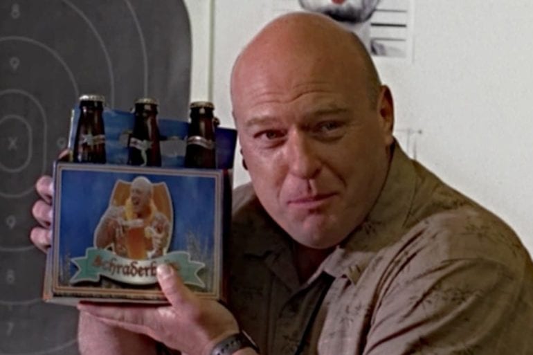Dean Norris holding a framed picture