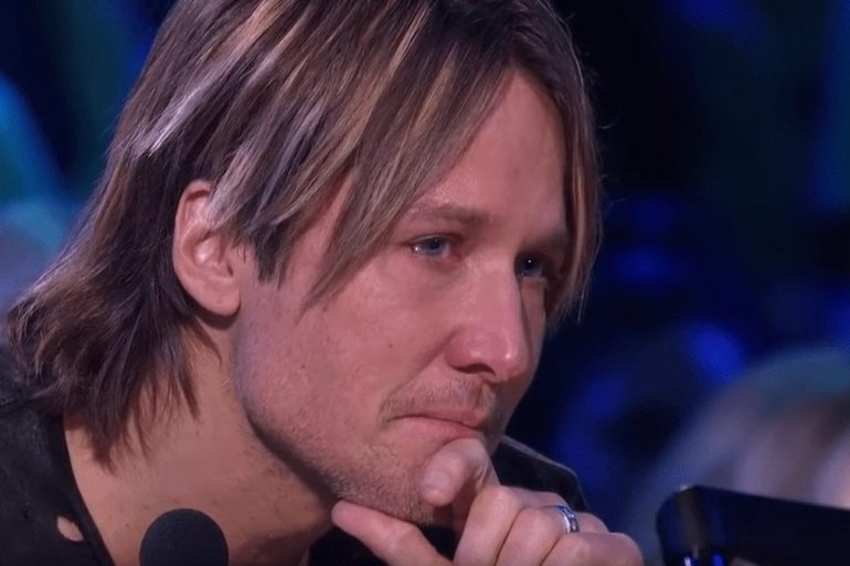 Keith Urban with a microphone