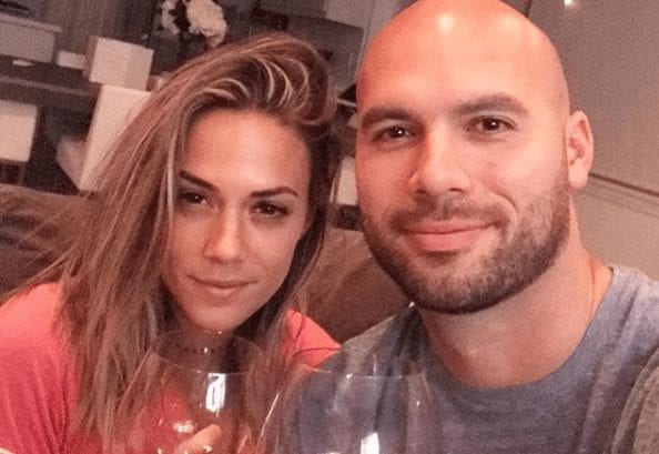 Mike Caussin, Jana Kramer are posing for a picture