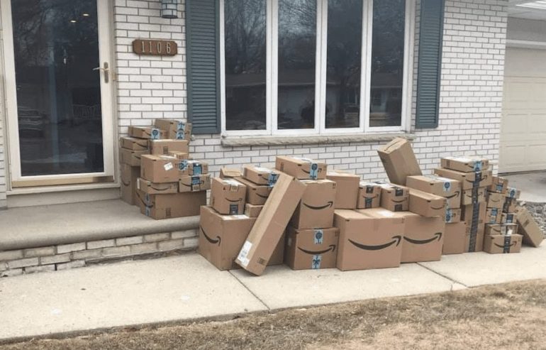 A pile of boxes outside a building