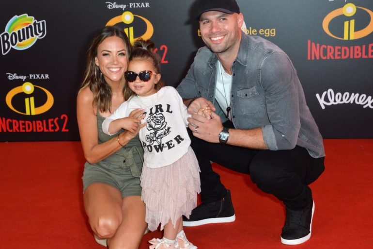 Mike Caussin, Jana Kramer et al. are posing for a picture