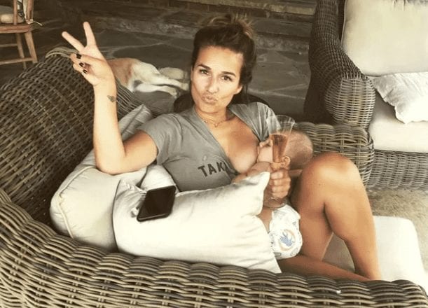 Jessie James Decker lying on a bed