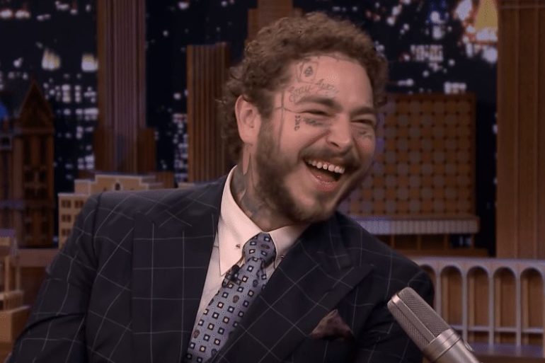 Post Malone in a suit and tie