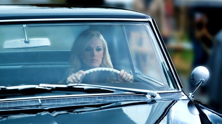 Carrie Underwood driving a car