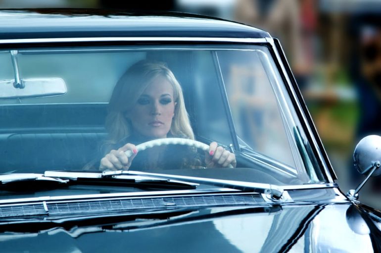 Carrie Underwood driving a car