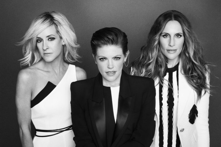 Natalie Maines, Emily Robison, Martie Maguire posing for the camera