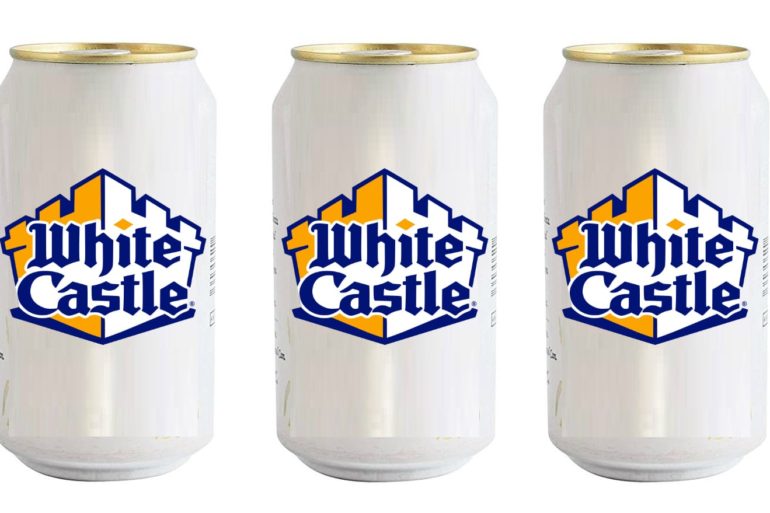 A pair of white cans with blue text on them