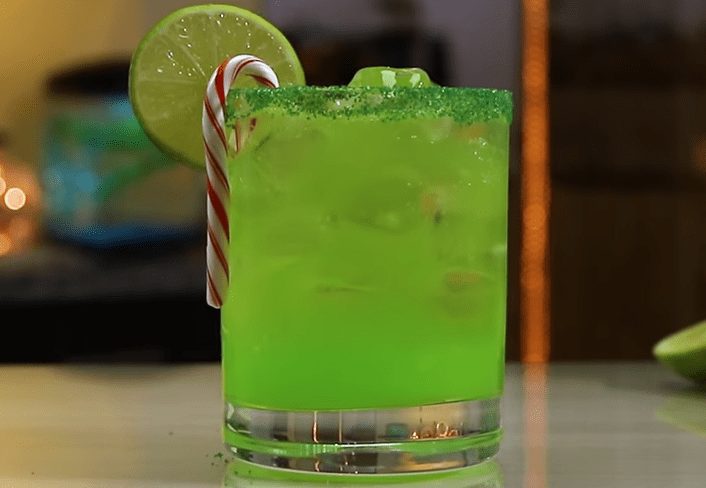 A green drink with a straw