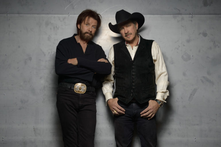 Ronnie Dunn, Kix Brooks are posing for a picture