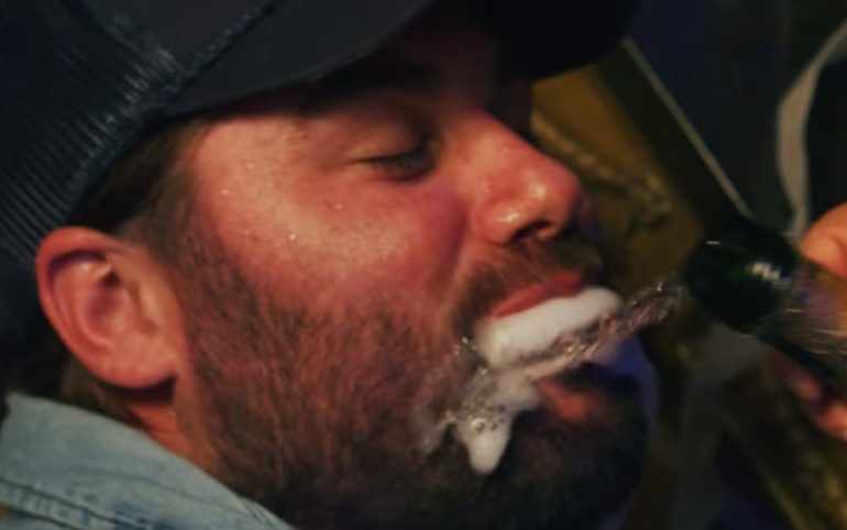 A man eating a cigar