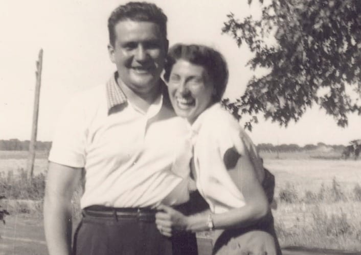 A man and a woman posing for a picture