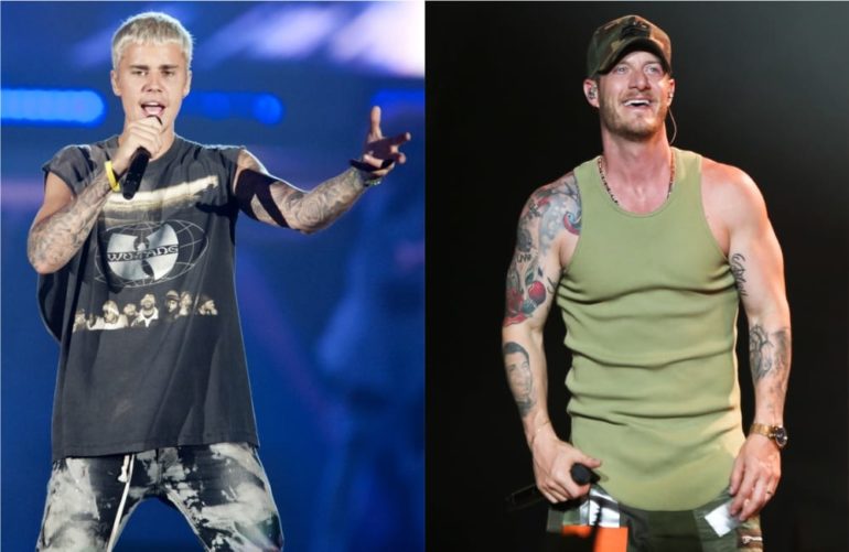 Tyler Hubbard, Justin Bieber are posing for a picture