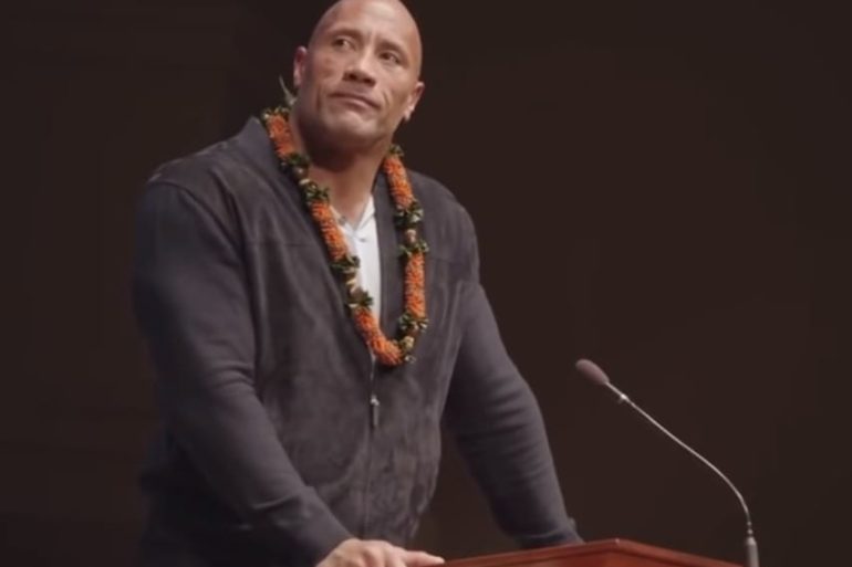 Dwayne Johnson in a suit and tie