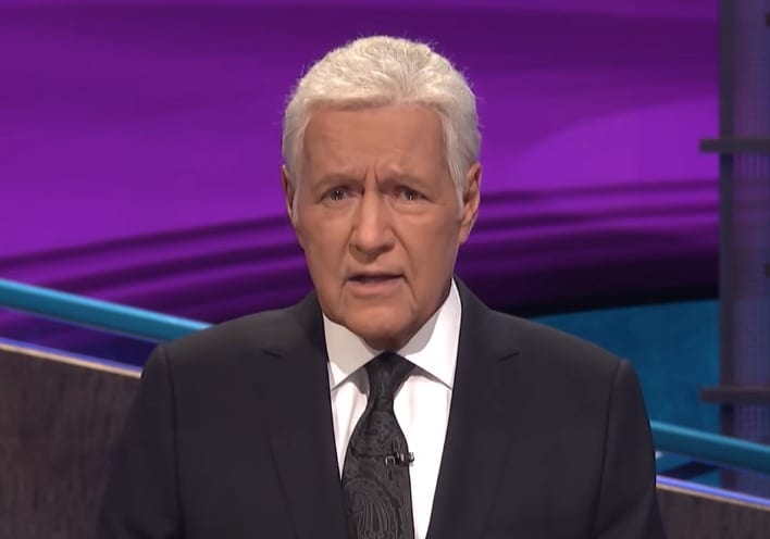 Alex Trebek in a suit and tie