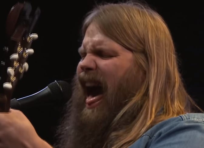 Chris Stapleton singing into a microphone