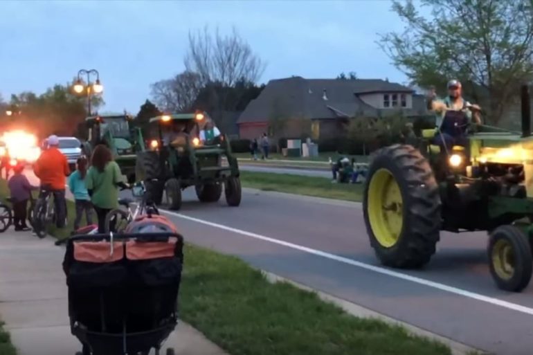A tractor pulling a cart
