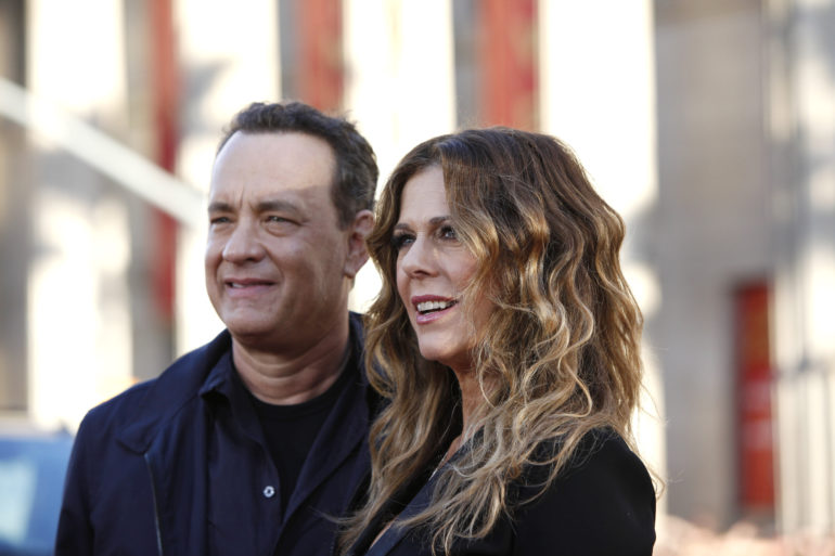 Tom Hanks, Rita Wilson are posing for a picture
