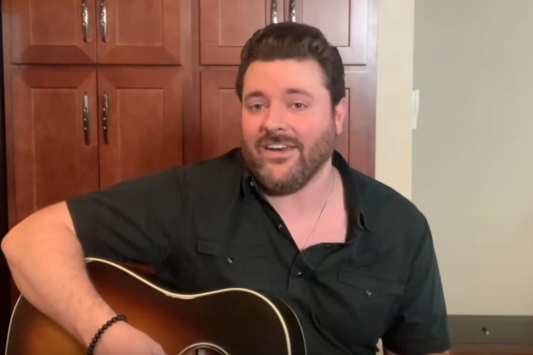 Chris Young sitting in a chair