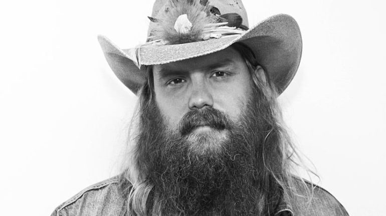 Chris Stapleton with a beard and a hat