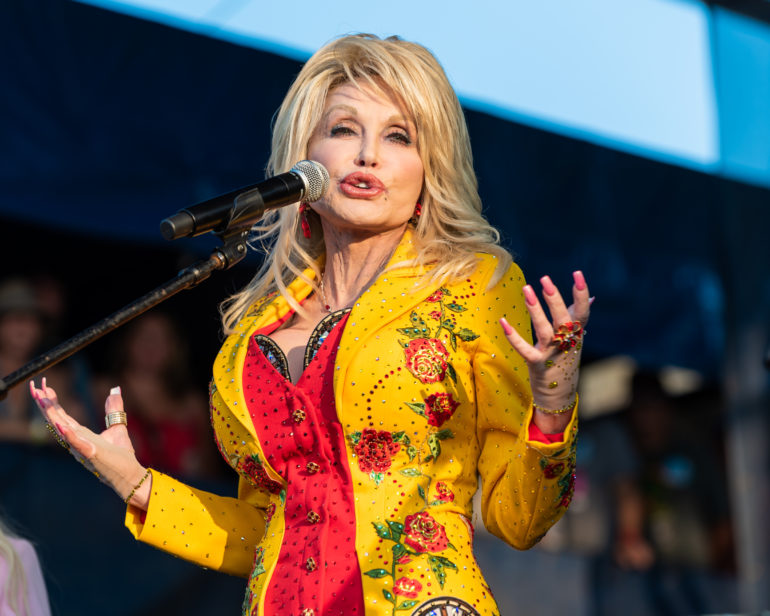 Dolly Parton with a microphone