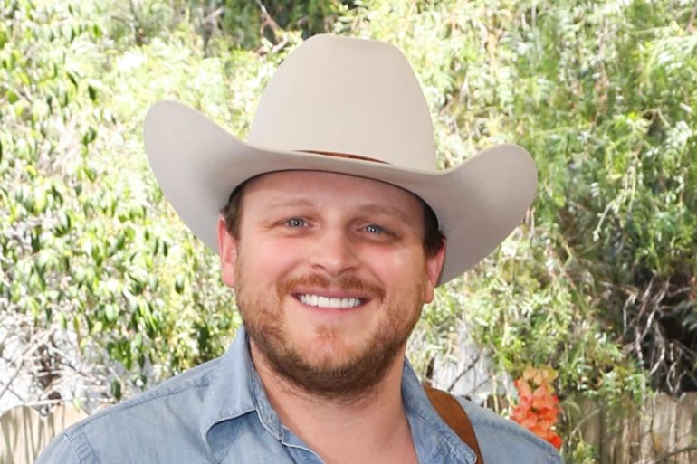 A man wearing a cowboy hat