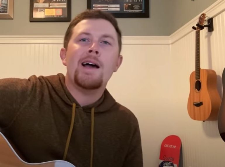 Scotty McCreery with a guitar