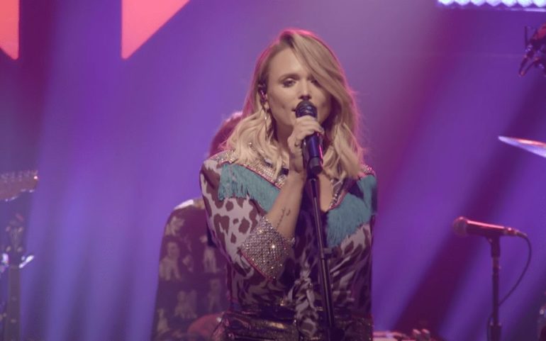 Miranda Lambert singing into a microphone
