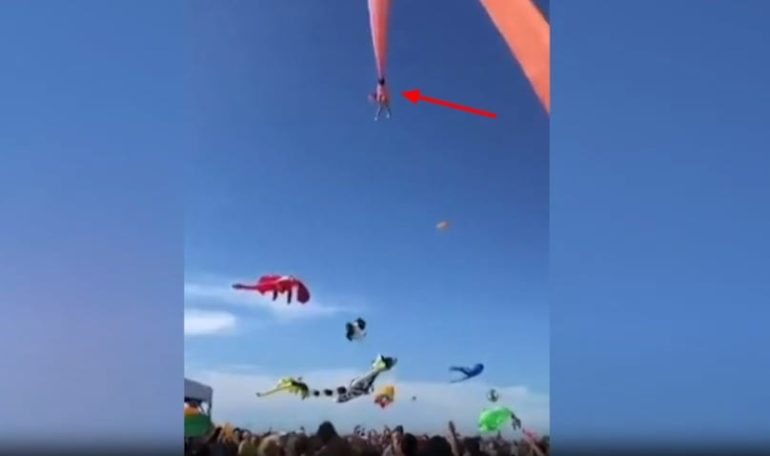 People flying kites in the sky