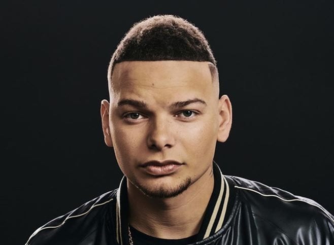 Kane Brown with a black background