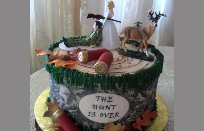 A cake with a horse and carriage on top