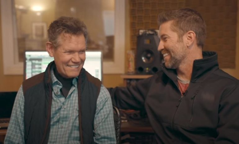 Randy Travis, Josh Turner are posing for a picture