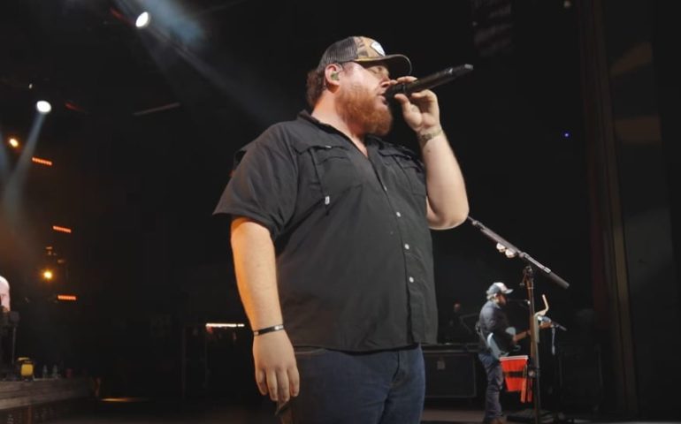 A man singing into a microphone