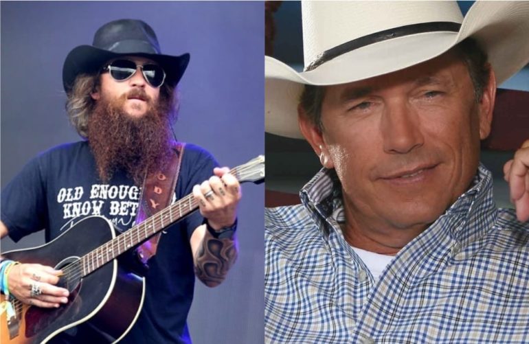 George Strait with a beard and a hat holding a guitar