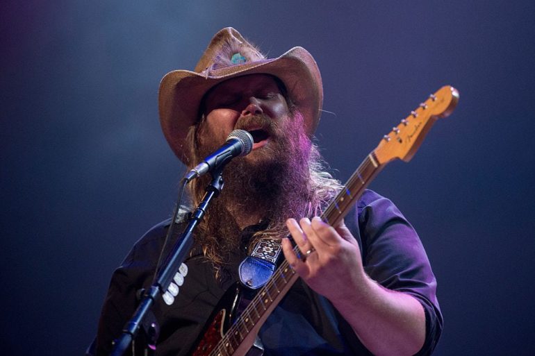 A person playing a guitar