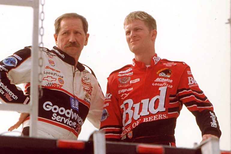 Dale Earnhardt, Dale Earnhardt Jr. are posing for a picture