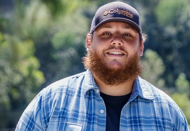 Luke Combs smiling for the camera