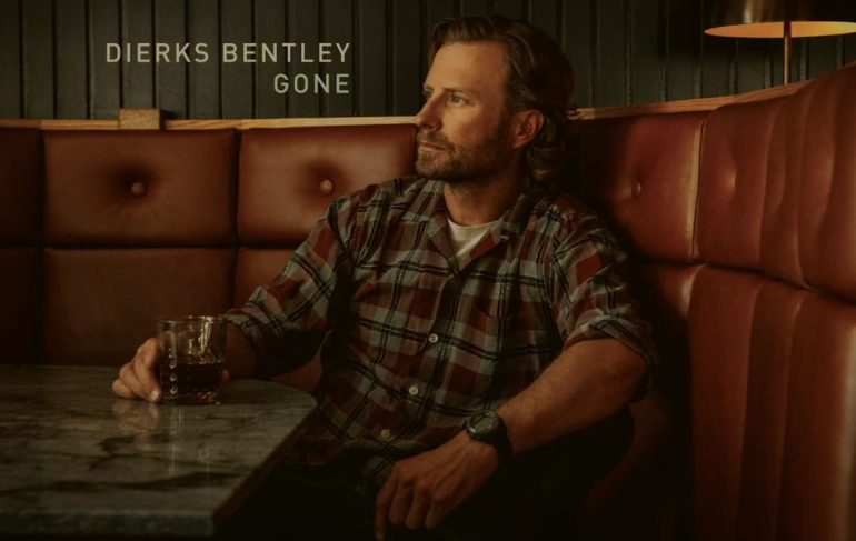 Dierks Bentley sitting at a table